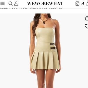 We wore what vegan leather skirt and tube top set. Worn once